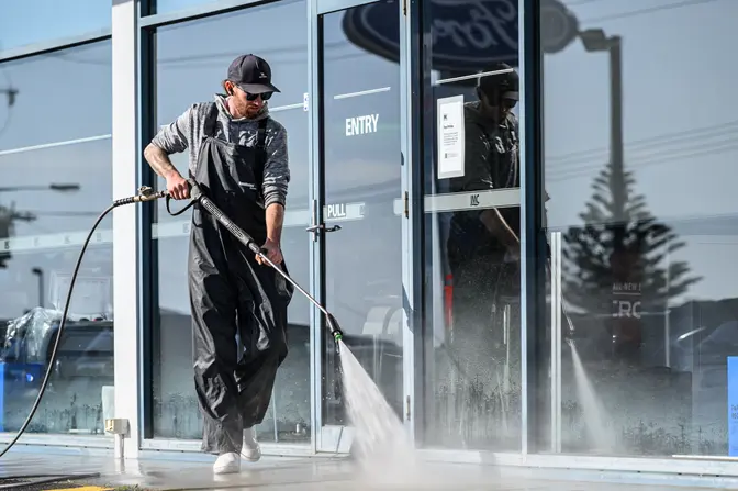 Jamie pressure cleaning concrete path